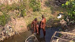 Hey, watch 2 strangers take turns banging this teenage village girl by the river.