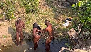 Hey, watch 2 strangers take turns banging this teenage village girl by the river.