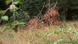 Busty German stepmom takes a black cock banging outdoors in wild group action.