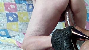 This amateur wife on the sofa couldn't handle the big dildo entering her.