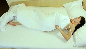 Psst, Watch Sexy Coed Rebecca Finger Herself Under the Blanket