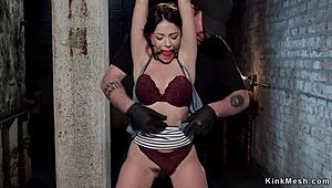 Brunette Gagged and Backbend Bondage