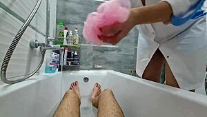stepmom walks in to wash naked stepson, ignores huge cock in bathroom