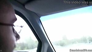 Hot babe, uh, strokin’ a cock while dude’s drivin’, caught on tape!