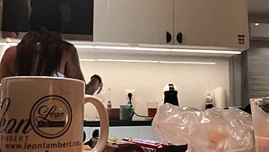 young amateur wife caught on voyeur cam while doing dishes