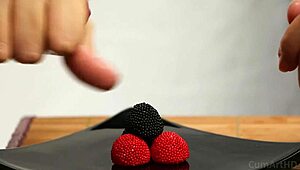 Cfnm handjob spills cum on candy berries