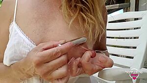 Nippleringlover Gets Kinky Inserting 18mm Vibrator into Extremely Stretched Pierced Nipples.