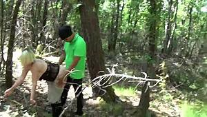 Hey, busty tattooed mature blonde licks and gets anal fucked outdoors! 😏