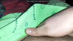 While my classmate searched for a book, I secretly masturbated under covers