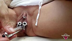 Nippleringlover Gets Kinky Inserting 18mm Vibrator into Extremely Stretched Pierced Nipples.