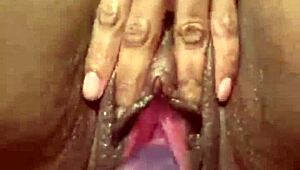 This amateur girl pumps her swollen pussy with a vibrator