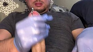 Flexible guy masturbates with plug