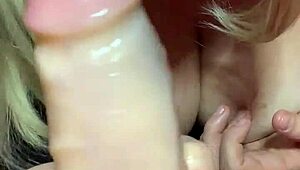 Slut wife gives big dildo a good sucking and tit fucking