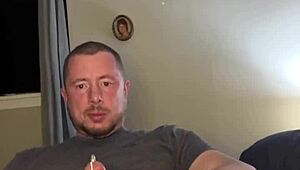 Flexible guy masturbates with plug