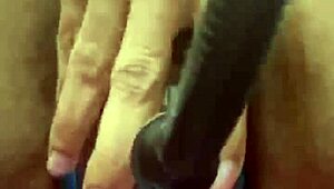 This amateur girl pumps her swollen pussy with a vibrator