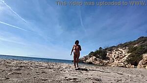 Curvy Nudist Stranger Teases with Dildo on Public Beach