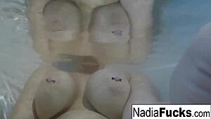 Does sexy Nadia masturbate in the bath with rubber duckies?