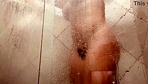 milf films herself cleaning hairy pussy in steamy bathroom