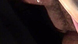 This ts gets a sloppy blowjob from a hooded black guy