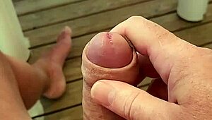 Extremely aroused guy almost finishes on mobile home terrace at campsite.