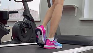 another day at the gym with this brunette bodybuilder getting wet and working out hard.