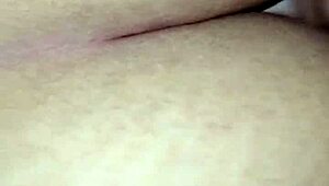 the tip enters her ass for anal fucking