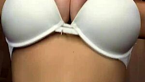 playing and dancing on bed with juicy big natural tits