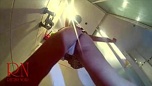 Hidden camera captures young naked girl stripping in shower room