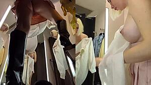 Upskirt blonde with big tits caught in public fitting room!