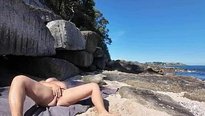 Curvy Nudist Wife Flaunts Hairy Pussy on Public Beach in Softcore Scene.