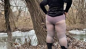Mother-in-law flashes big panties in white pantyhose. She pees outdoors in public with huge ass.