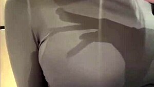 My milky stepmom teases by licking her own nipples—what a wild, tempting sight to see.