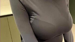 My milky stepmom teases by licking her own nipples—what a wild, tempting sight to see.