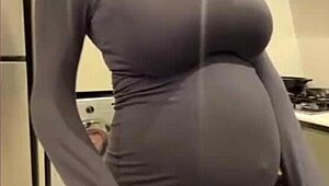 My milky stepmom teases by licking her own nipples—what a wild, tempting sight to see.