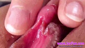 Jav close-up of stunning female pussy on Javfux com. Beautiful and uncensored!