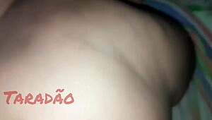 Woman moaning during massage in lingerie.