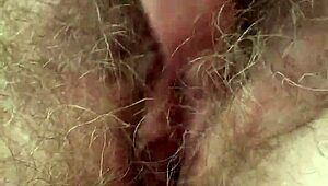 Wow, watch me stroke my hairy pussy till I explode!