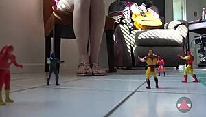 Giantess blonde model towers over toys and balloons, dominating with heels in wild play. Her tall frame rules!