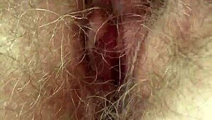 Wow, watch me stroke my hairy pussy till I explode!