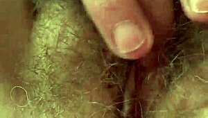 Wow, watch me stroke my hairy pussy till I explode!