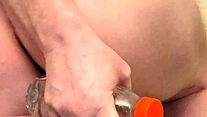 I’ve got water bottle and dildos stuffed in my ass!