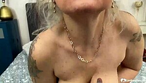 busty granny shows off her stunning body in a teasing homemade close-up. she still drives everyone wild with those curves.