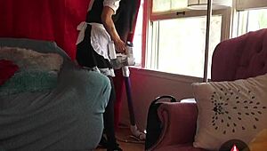 French maid bends over while vacuuming in tight skirt and stockings