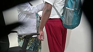 Lady doctor examines school student in hospital setting