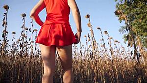 Hot MILF teases with sexy thong ass in short skirt outdoors.