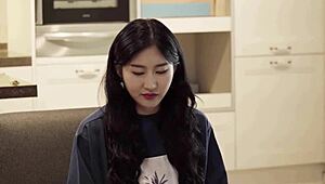 Female hospitality secretary shines in soft Korean setting.