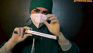 The latex-gloved femdom mistress dominates her submissive in a fetish session