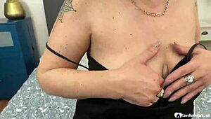 busty granny shows off her stunning body in a teasing homemade close-up. she still drives everyone wild with those curves.