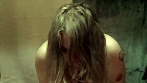 slave girl self-binds with belt