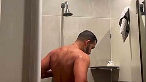 Gym shower time with red thong leads to steamy bathing fun! 🚿